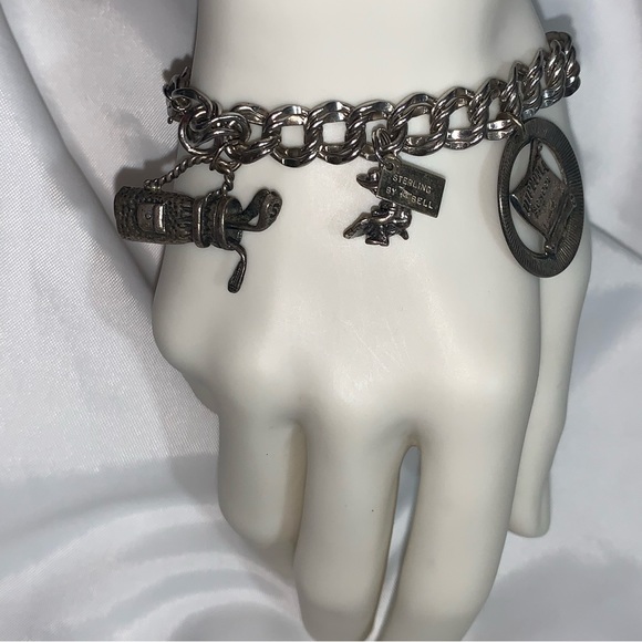 vintage CHARM BRACELET w/7 sterling silver charms